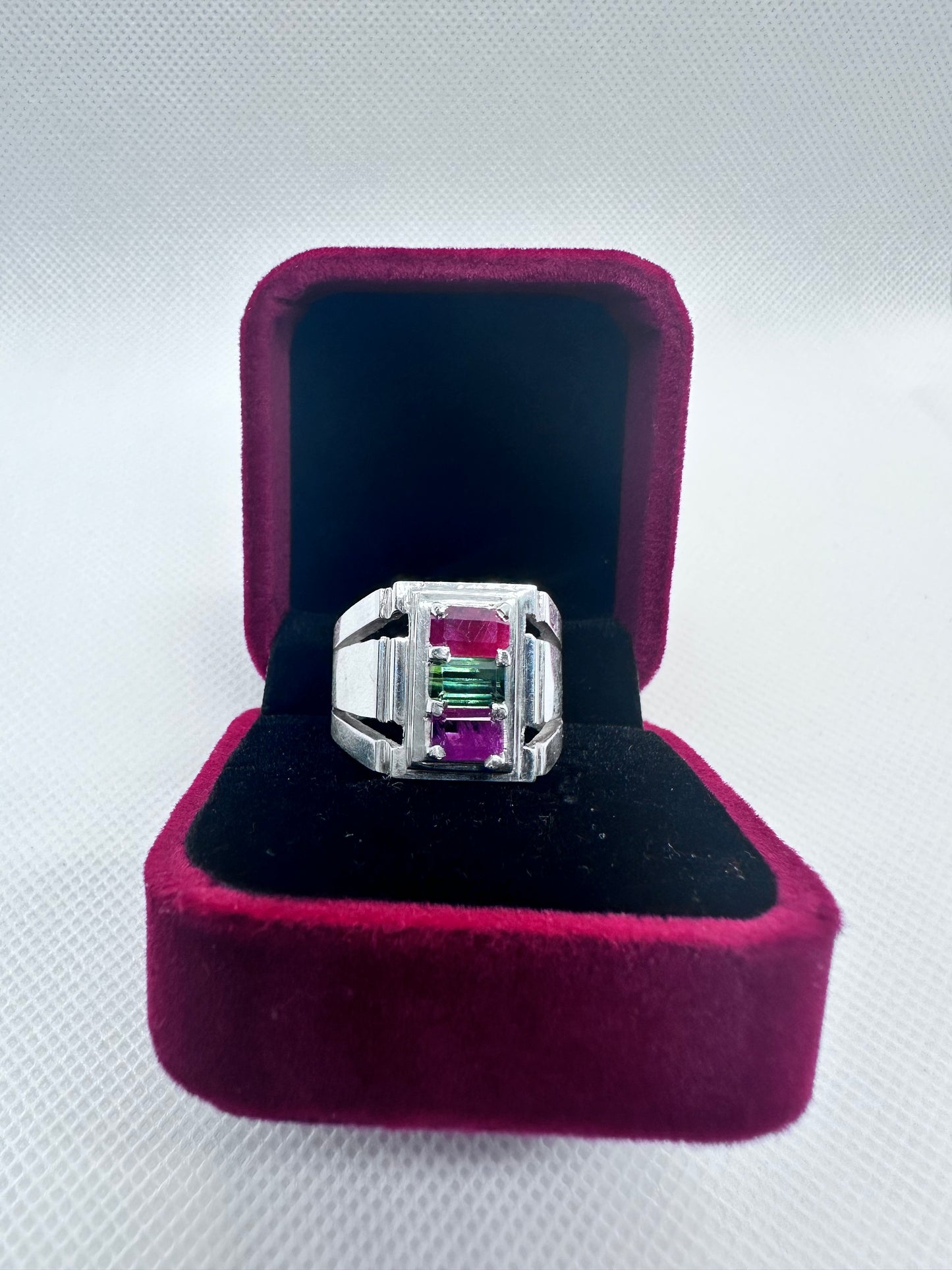 Pure silver ring with natural rubies and a tourmaline