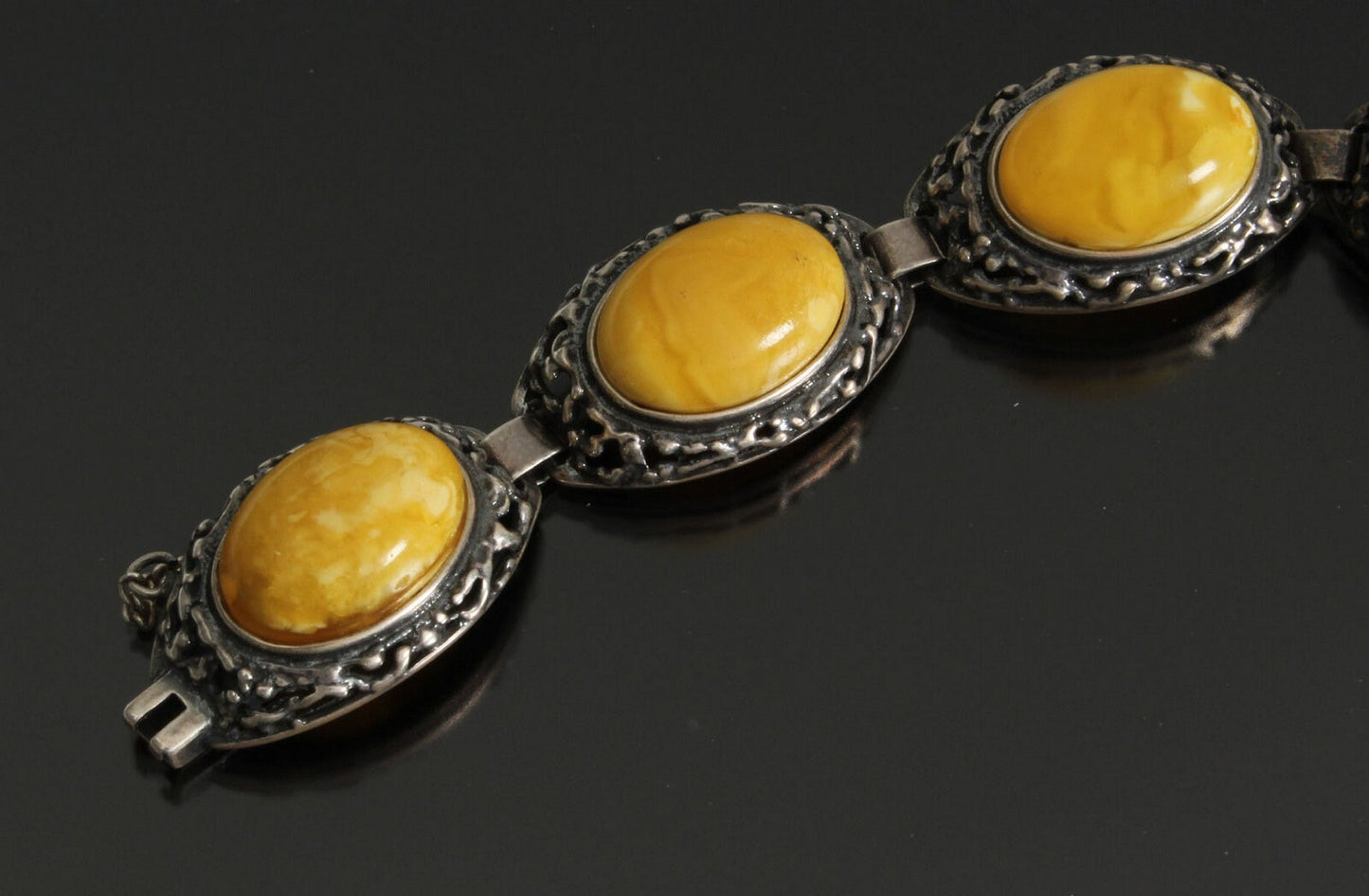 Amber pendant, a ring and a bracelet in silver 58 grams.