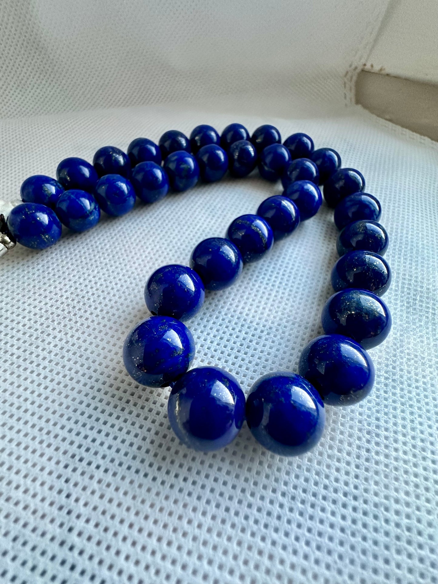 Deep blue lapis lazuli necklace with golden pyrite inclusions