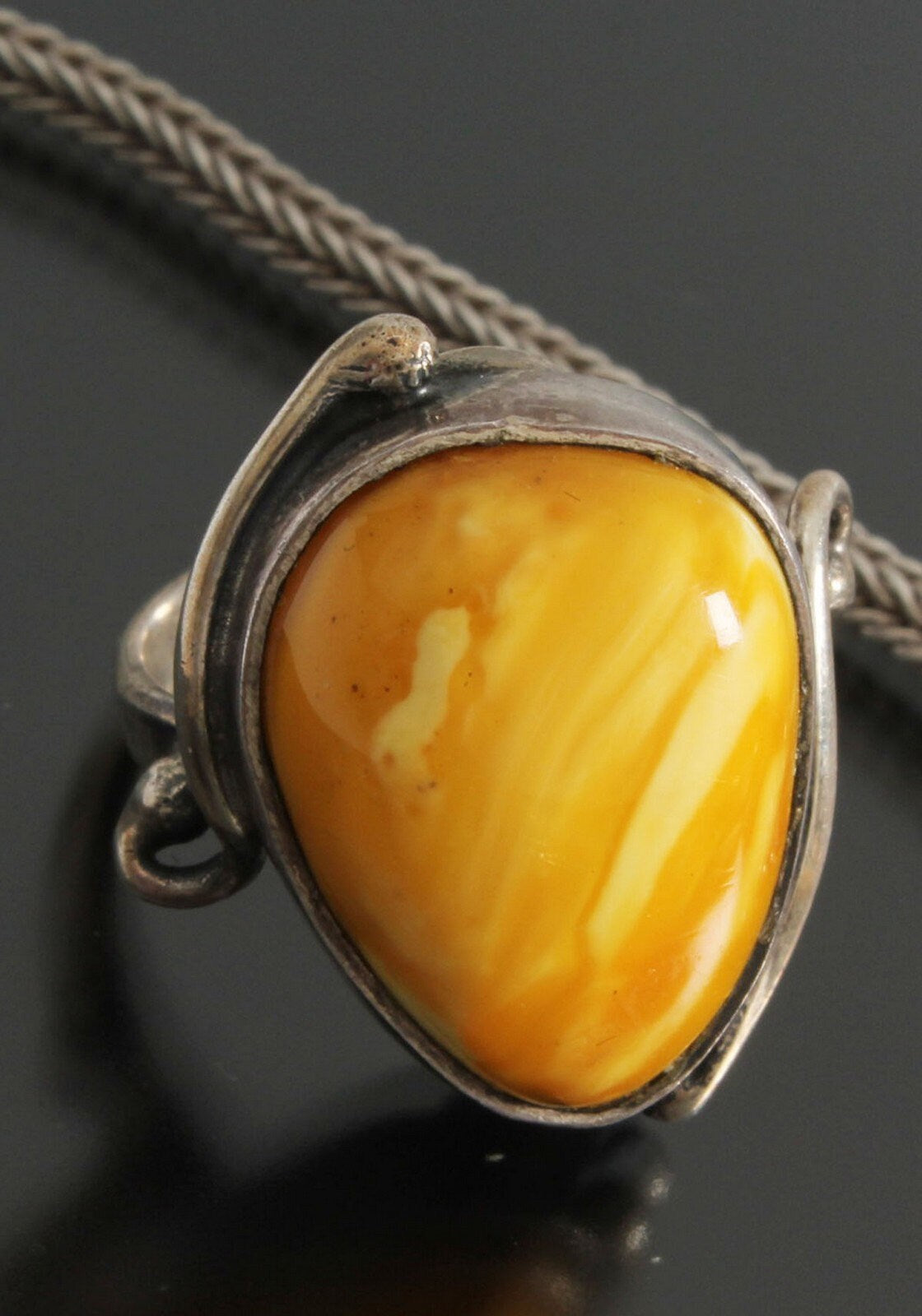 Amber pendant, a ring and a bracelet in silver 58 grams.