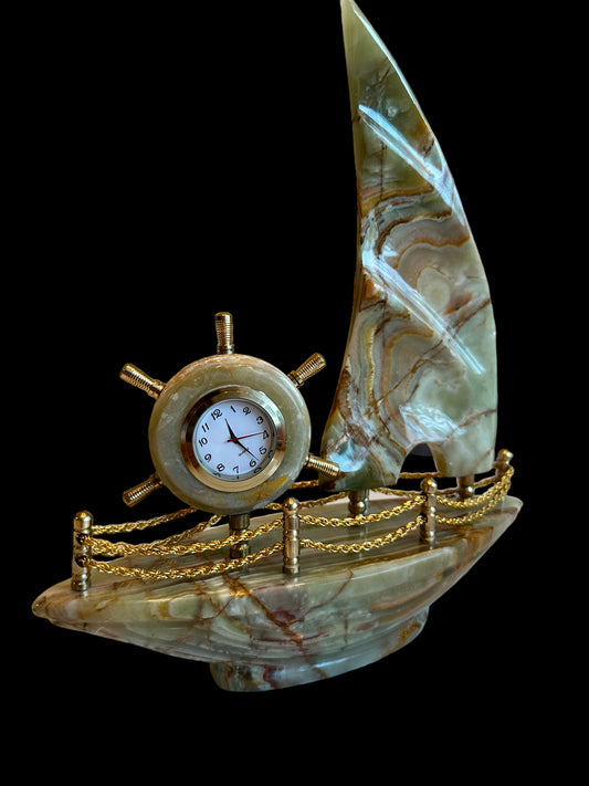 Handcrafted marble boat with a clock