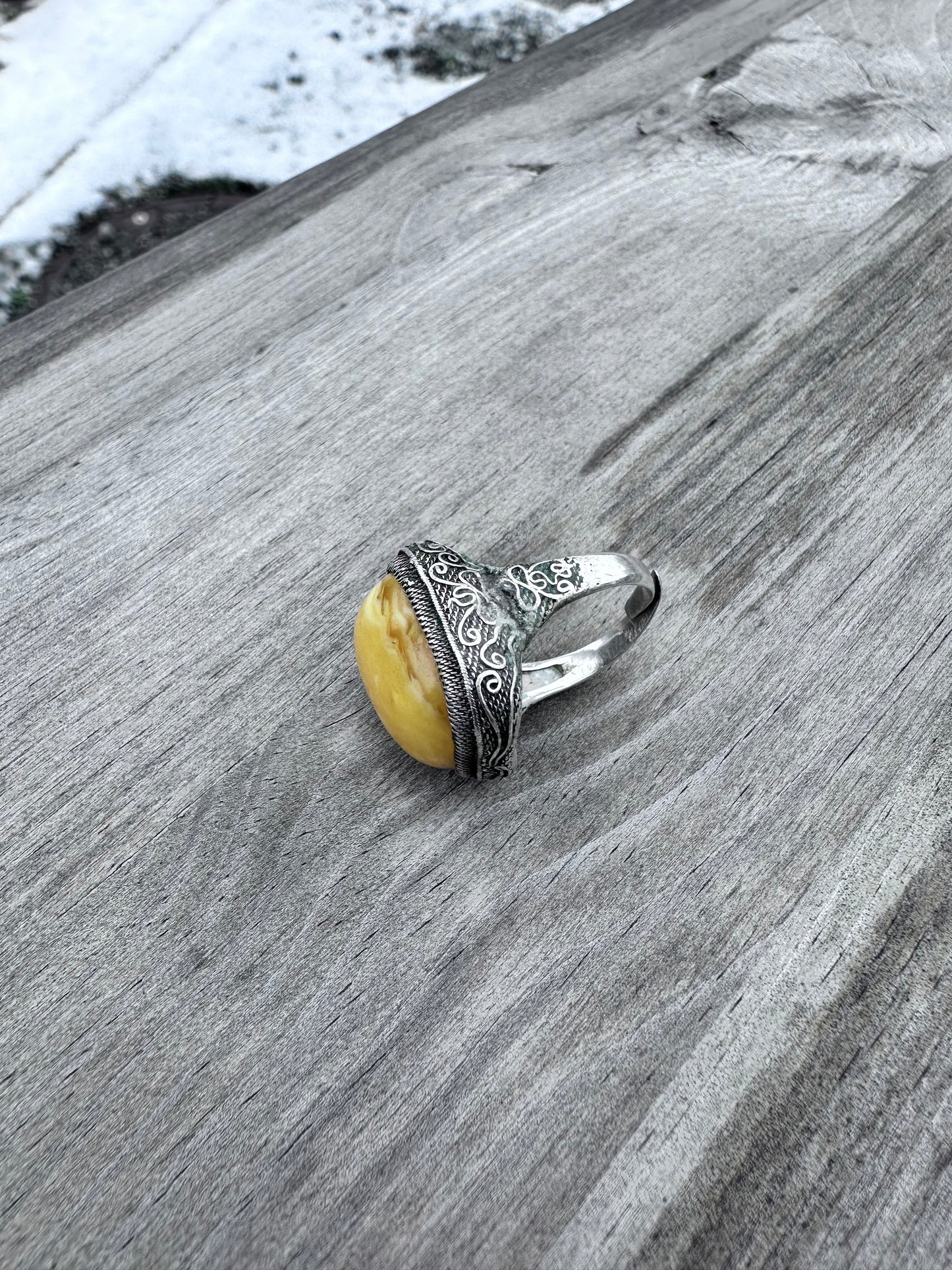 Natural amber in silver ring