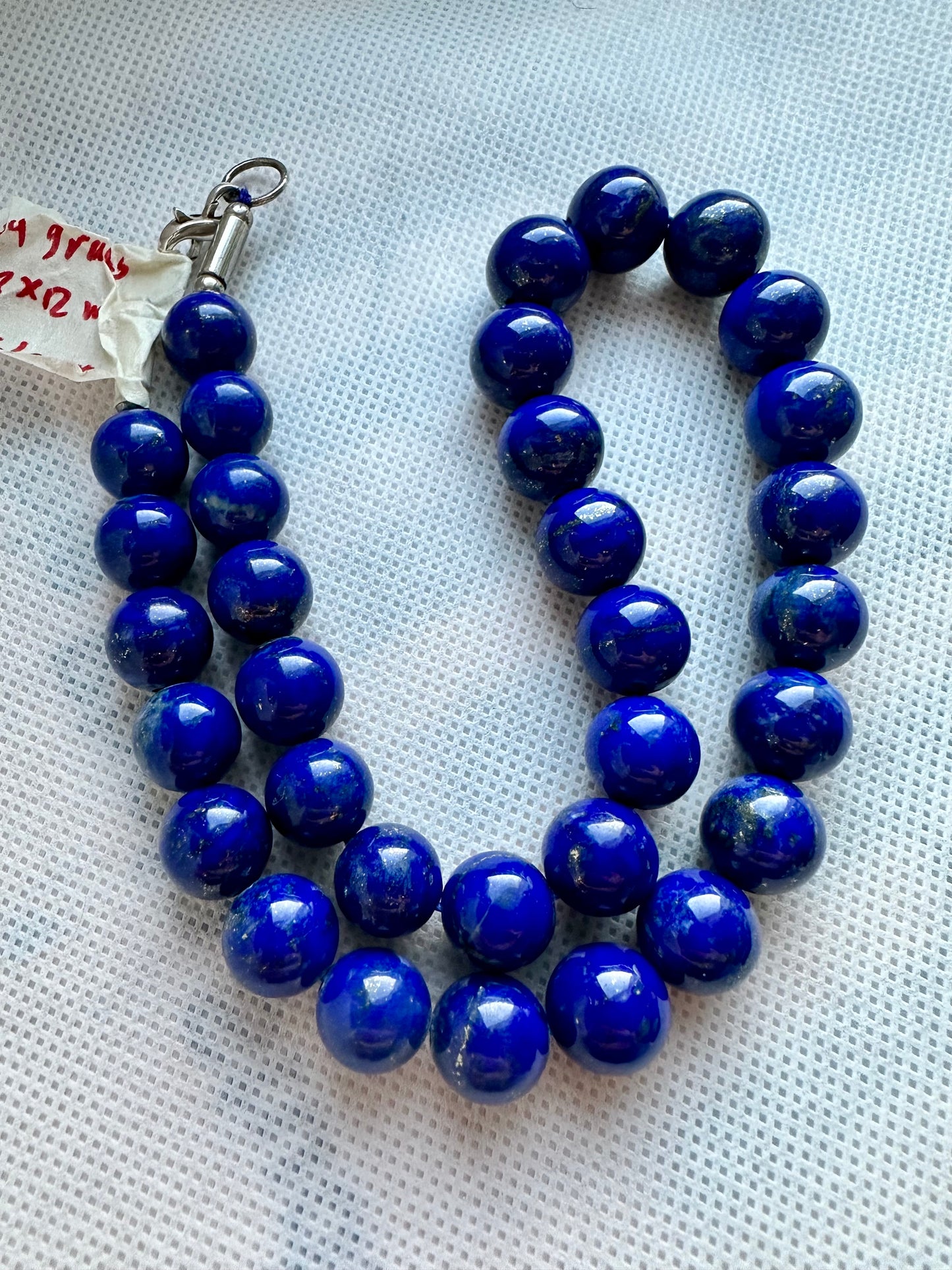 Deep blue lapis lazuli necklace with golden pyrite inclusions