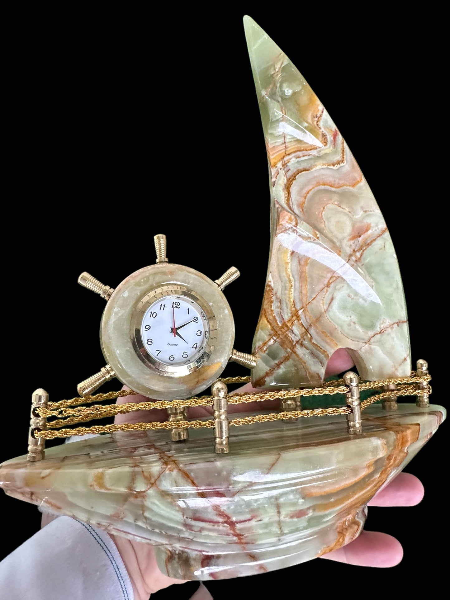 Handcrafted marble boat with a clock